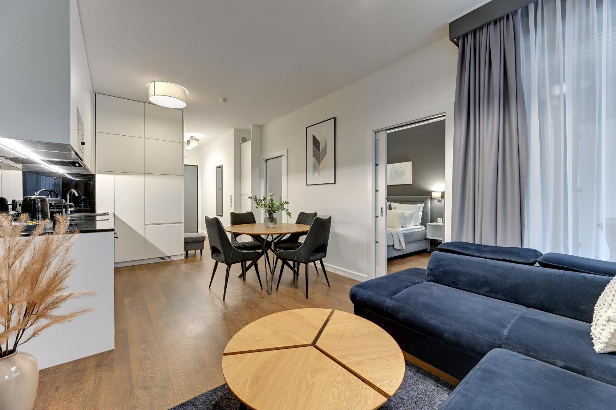 Granaria Deluxe & Riverside By Downtown Apartments — Photos 1